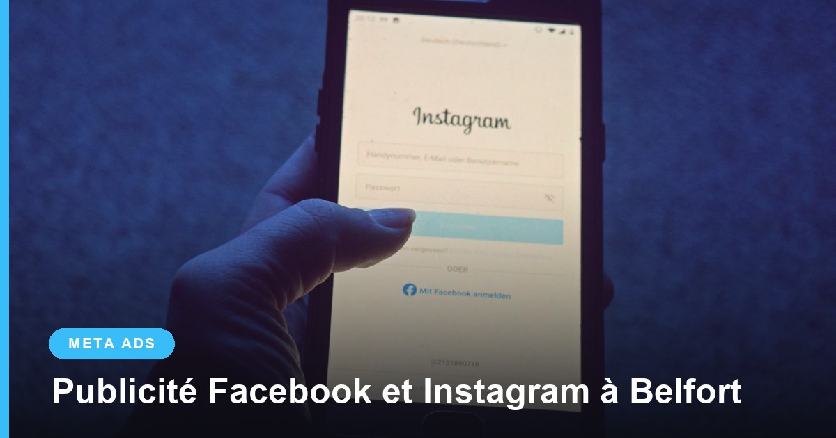 Main tenant un smartphone affichant l’écran de connexion Instagram